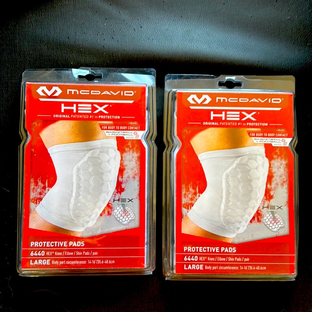 Unopened McDavid Hex protective pads. White, size large, knee and elbow pads.